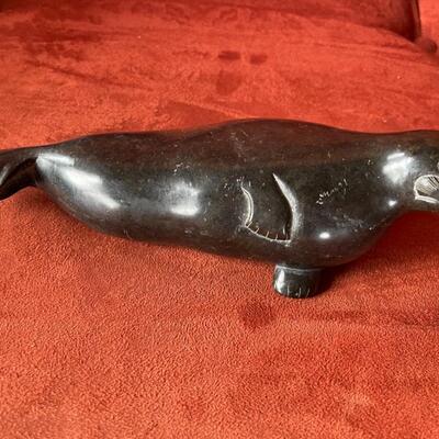 Item 18. Carved seal sculpture in black soapstone, Inuit, signed by artist, 1950’s,