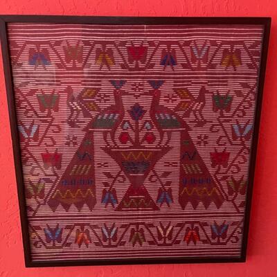 Item 39. Peruvian woven framed textile art panel, two peacocks on fountain.