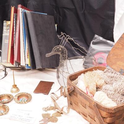 Lot 113 Scrapbook, books, rack, Vintage egg basket, thumb oil can, Basket filled with wool yarns