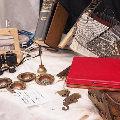 Lot 113 Scrapbook, books, rack, Vintage egg basket, thumb oil can, Basket filled with wool yarns