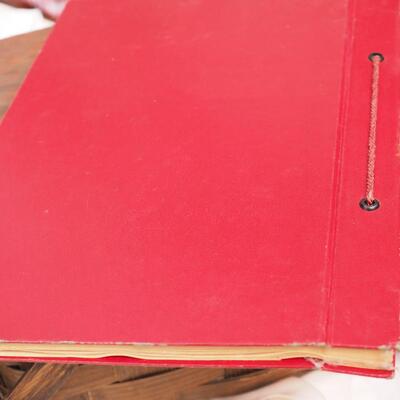 Lot 113 Scrapbook, books, rack, Vintage egg basket, thumb oil can, Basket filled with wool yarns