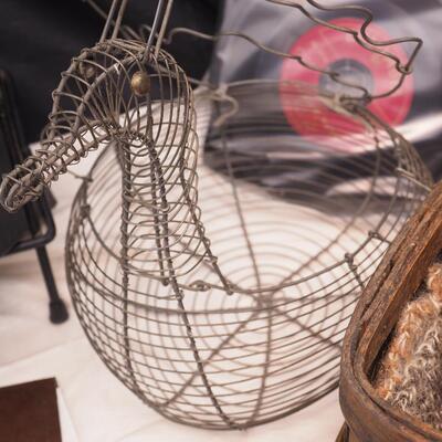 Lot 113 Scrapbook, books, rack, Vintage egg basket, thumb oil can, Basket filled with wool yarns