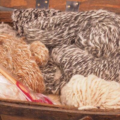 Lot 113 Scrapbook, books, rack, Vintage egg basket, thumb oil can, Basket filled with wool yarns