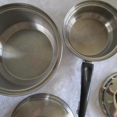 #47 Two Lustre Craft saucepans with lids