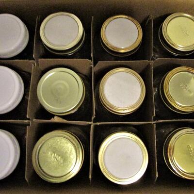 #77 Twelve Pint size canning jars, regular mouth