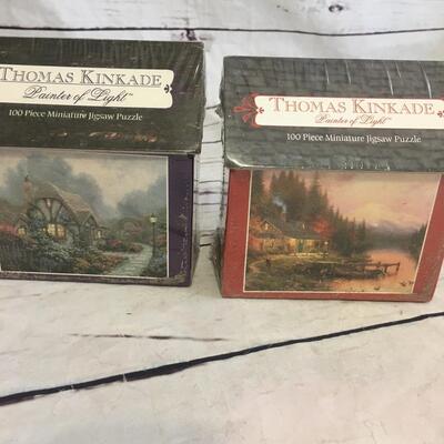 New Sealed Thomas Kinkade puzzles 