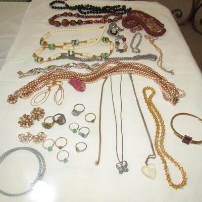 LOT 1-lot of costume Jewelry including many rings.