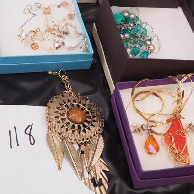 Lot 118 Necklaces and glass display