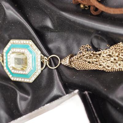 Lot 118 Necklaces and glass display