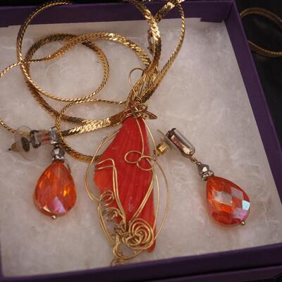 Lot 118 Necklaces and glass display