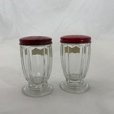 -65- VINTAGE | Clear Glass Footed | Salt and Pepper | Red Lids