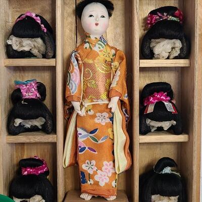 Lot 27: Antique Japanese Doll, Tin Toy, and World's Fair Collectibles