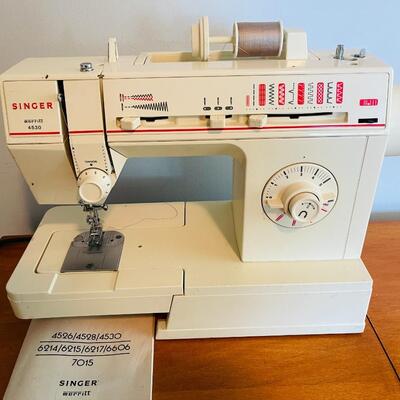 Lot 94  Singer/Merritt Portable Sewing Machine #4530 & Manual