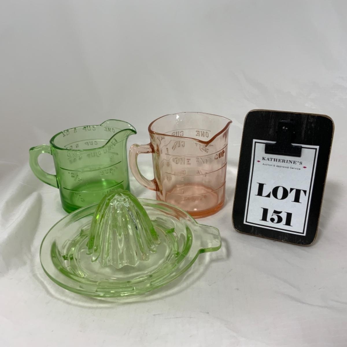 Sold at Auction: Kitchen utensils including Pyrex measuring cups