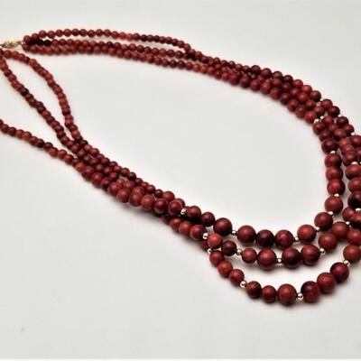 Lot #47  Triple Strand Graduated Coral Bead Necklace with 14kt gold clasp and spacers