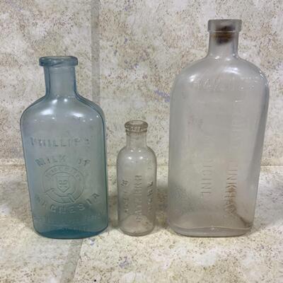 -257- VINTAGE | Three Glass Embossed Bottles