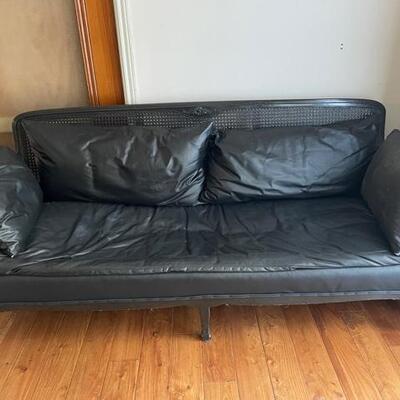 **Antique Cane-Back Settee with Leather Cushions