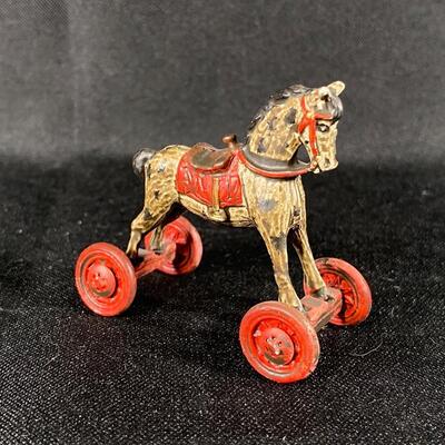 Miniature Painted Cast Metal Ride On Horse