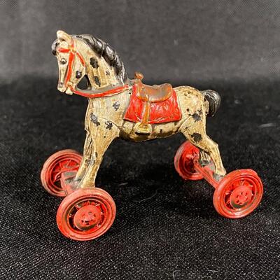 Miniature Painted Cast Metal Ride On Horse