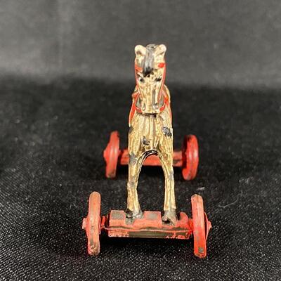 Miniature Painted Cast Metal Ride On Horse