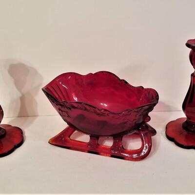 Lot #117  Ruby Red Glass Sleigh and Candlesticks