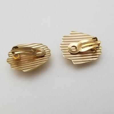 Lot #139  Pair of 14kt gold clip earrings - shell motif