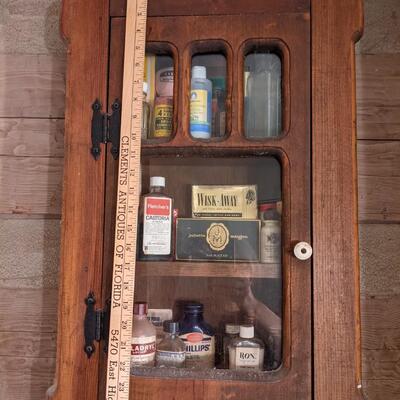 Antique cabinet full of vintage goodies