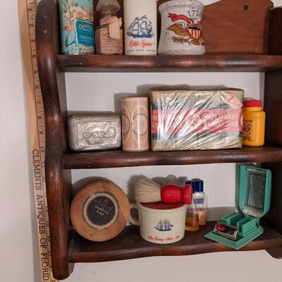 Antique wall shelf full of more goodies