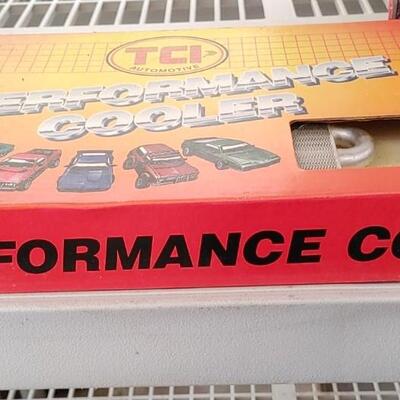 #147 TCI Performance Cooler new in box  & Husky light.