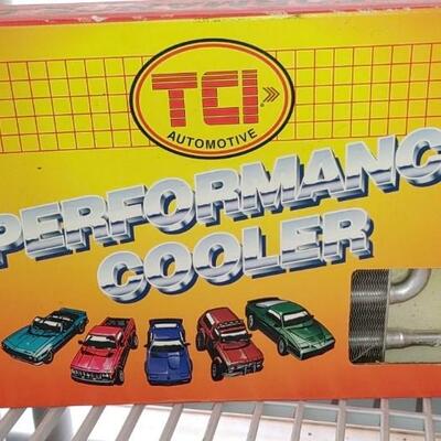 #147 TCI Performance Cooler new in box  & Husky light.