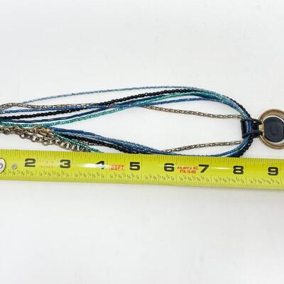 CHICOâ€™S BLUE AND GOLD TONED PENDANT NECKLACE
