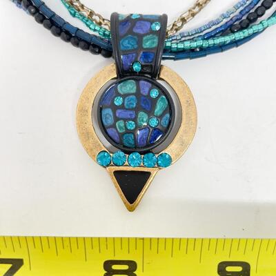 CHICOâ€™S BLUE AND GOLD TONED PENDANT NECKLACE