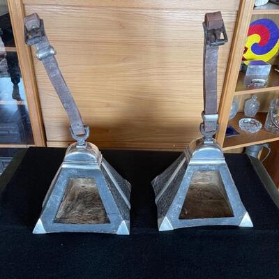 Item 11. Pair of Peruvian Pyramid shape wood and sterling silver stirrups with leather straps, circa 1900’s, country of origin Peru.