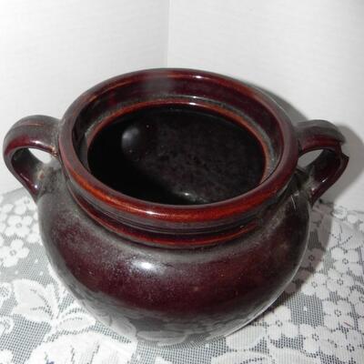 USA COLLECTIBLE POTTERY AND RUSTIC METAL CHIME