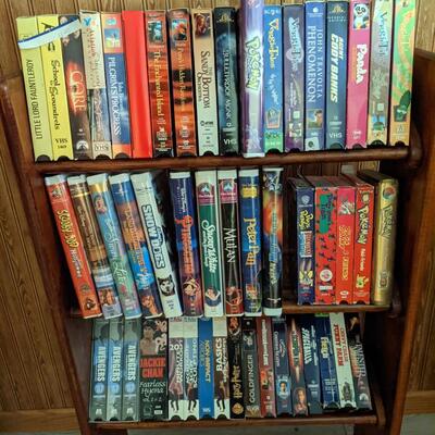 Very nice solid wood rack for CD's, etc. comes with the VHS!
