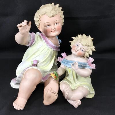 Set of 2 Porcelain Little Girl Piano Baby Statues