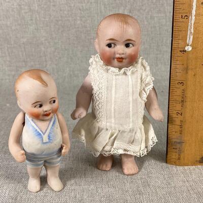 Pair of Bisque Dollhouse Dolls Side Looking 