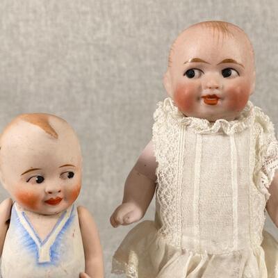 Pair of Bisque Dollhouse Dolls Side Looking 