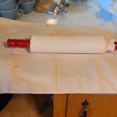 Vintage rolling pin and flour mat