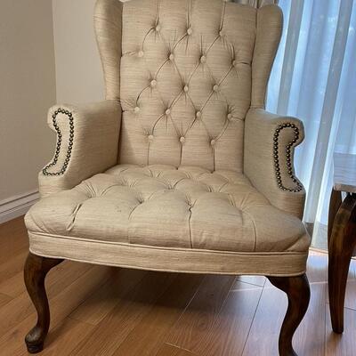 Pair of Cream Winged chairs with Tuffing 