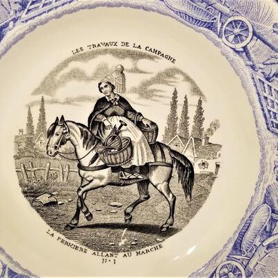 Lot #242  Charming Antique French Plate "The Lady Farmer"