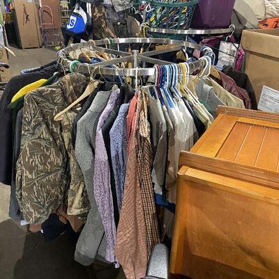 clothes on a rack. rack's for sale too. if you want it. 