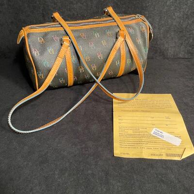 Lot 129 Dooney and Bourke Barrel Bag 