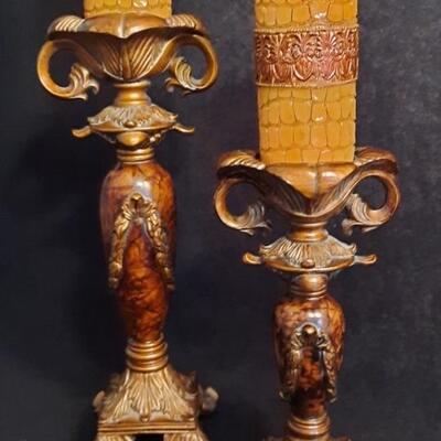Lot 163  Ornate Pillar Candle Stands and 2 Designer Candles