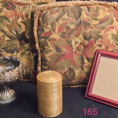 Lot 165  Accent Pillows, Golden Pillar Candle, Wood Frame, and Decorative Potpourri/Candle Stand.