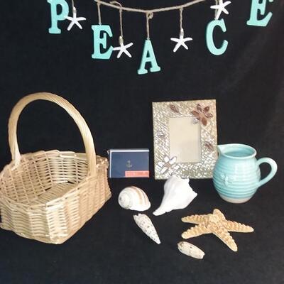 Lot 190 "Peace" wall art, Frame, Dragonfly Pitcher, Shells, Starfish, Anchor Note Cards, and Basket