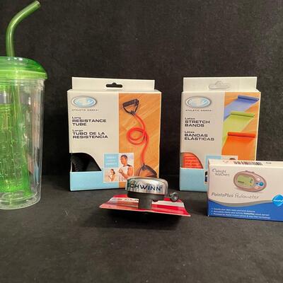 Lot 216  Resistance Tubes, Stretch Bands, Bike Bell, Pedometer and Tumbler