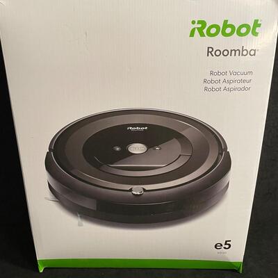 Lot 218  iRobot Roomba Vacuum