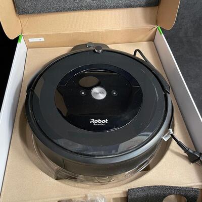 Lot 218  iRobot Roomba Vacuum