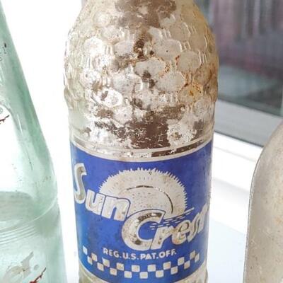#204 (7) Vintage Soda Bottles 